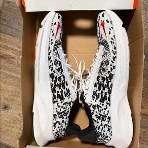 Nike Black and White Sneakers with Red Details